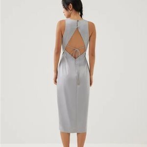 Khan satin padded open back midi dress